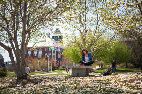 Plymouth student outdoors on campus